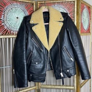 Coach black leather with sherpa collar